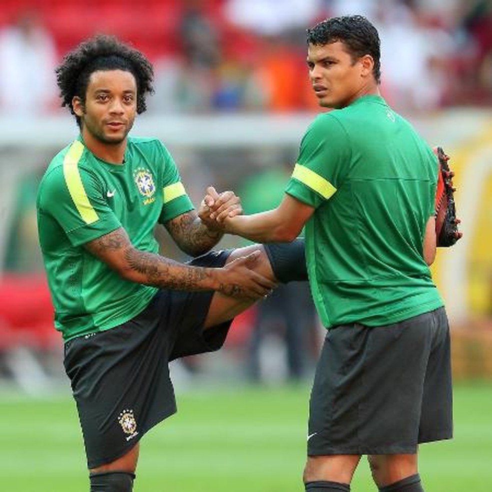 Formados no Flu, Marcelo e Thiago Silva jogaram lado a lado na seleção brasileira a partir de 2008 — Foto: Adalberto Marques/AGIF